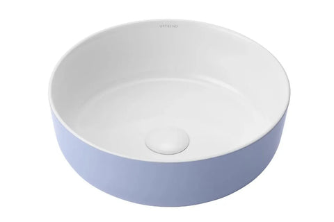 Ronde wit-blauwe keramische waskom als opbouwmodel 38,5x38,5x15cm met centraal afvoergat, ideaal voor moderne badkamers met rustige kleuren